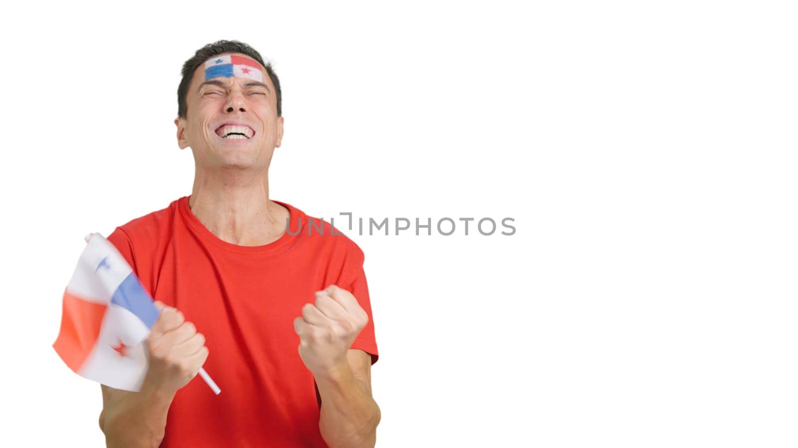 Man passionately cheering for Panama screaming and waving a national flag