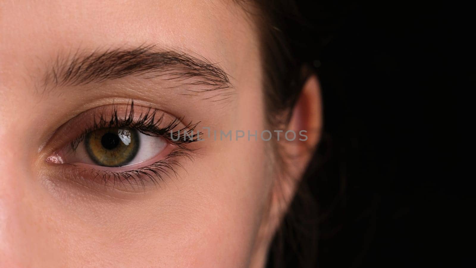 Close-Up Of A Girl'S Large Eye With Long Eyelashes