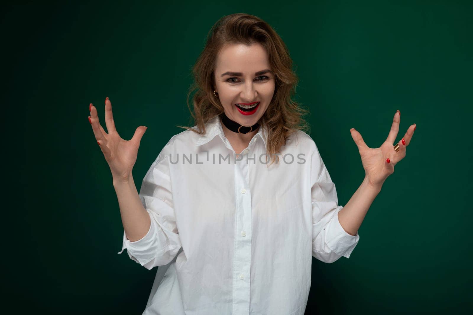 A woman is depicted wearing a crisp white shirt and a trendy black choker around her neck, creating a fashionable and stylish look. The contrast between the white shirt and black choker adds a subtle but edgy element to her outfit.