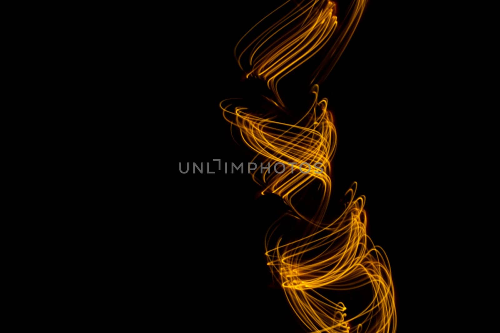 Long exposure light painting, curvy lines vibrant neon metallic yellow gold on black background by PaulCarr