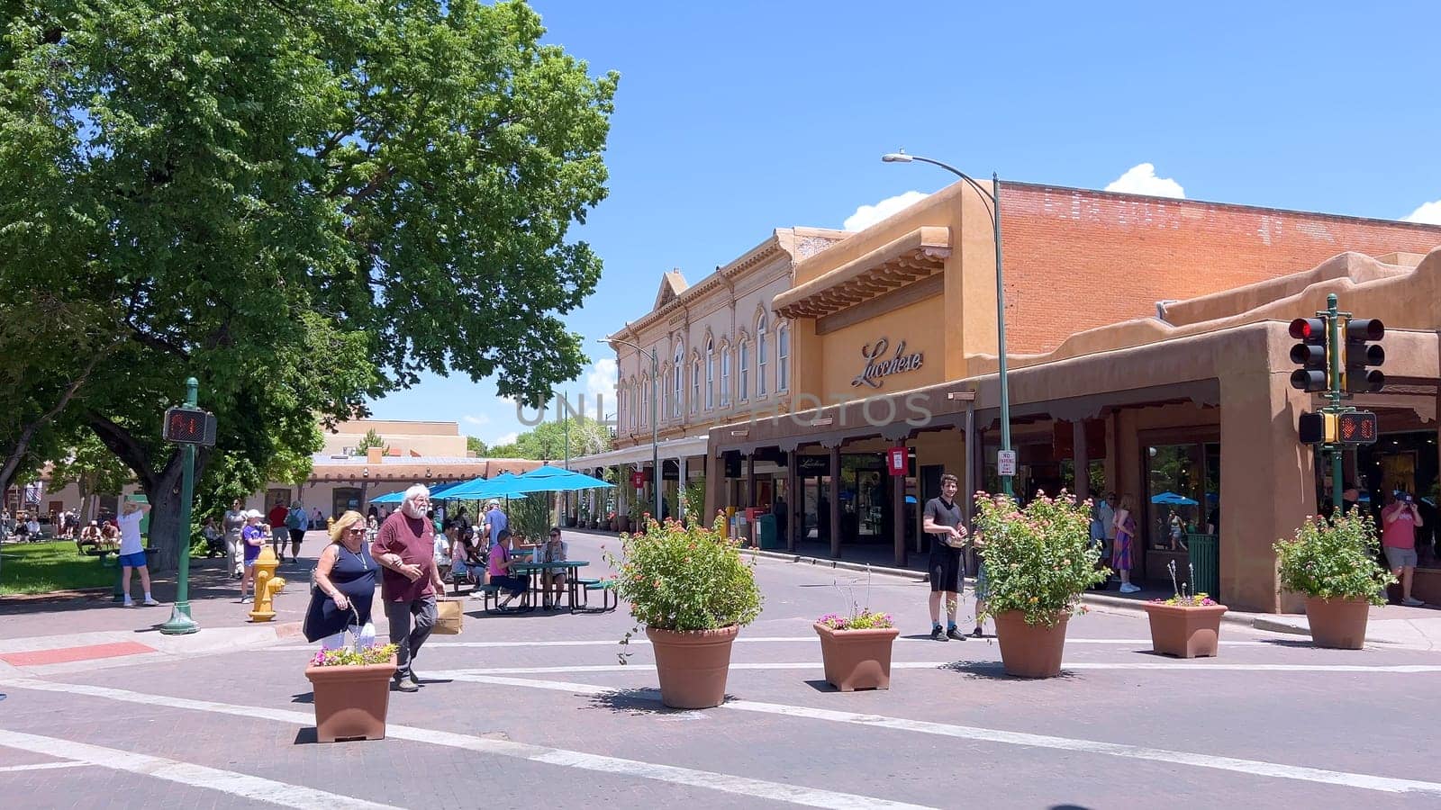 Main Square of Historic Downtown with Traditional Adobe Buildings by arinahabich