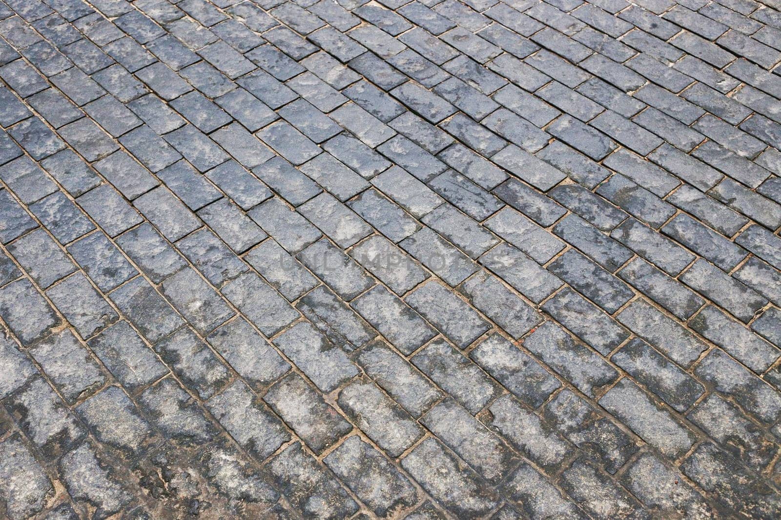 Old cobblestone street, cobblestone, tiled floor, pavement ground texture.. old tiles.