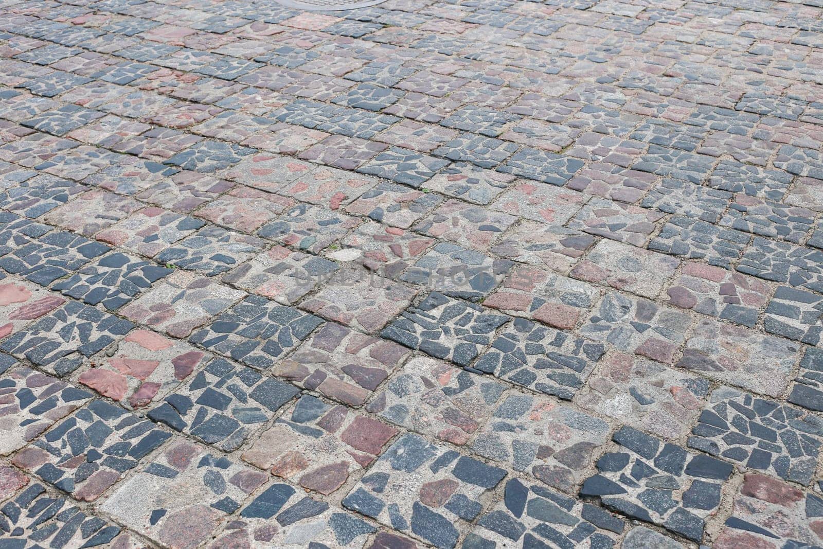 brick paving stones fo pattern path sidewalk abstract background rough road urban stone block paved.