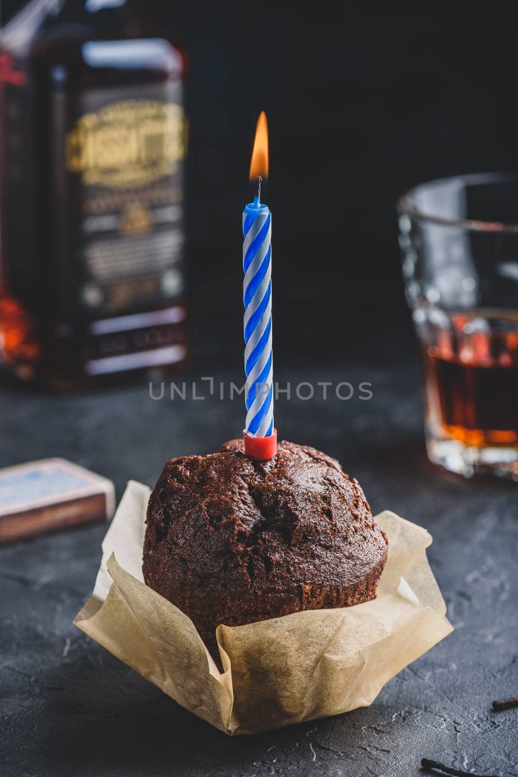 Chocolate muffin with birthday candle by Seva_blsv