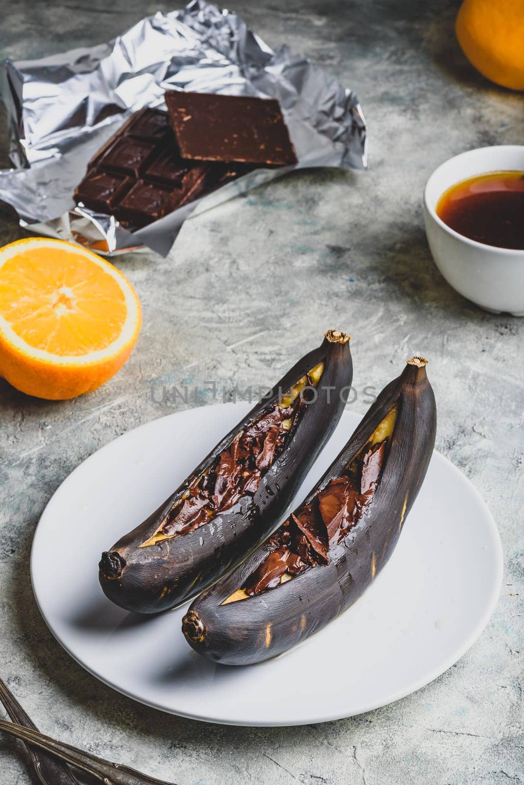 Grilled bananas with dark chocolate by Seva_blsv