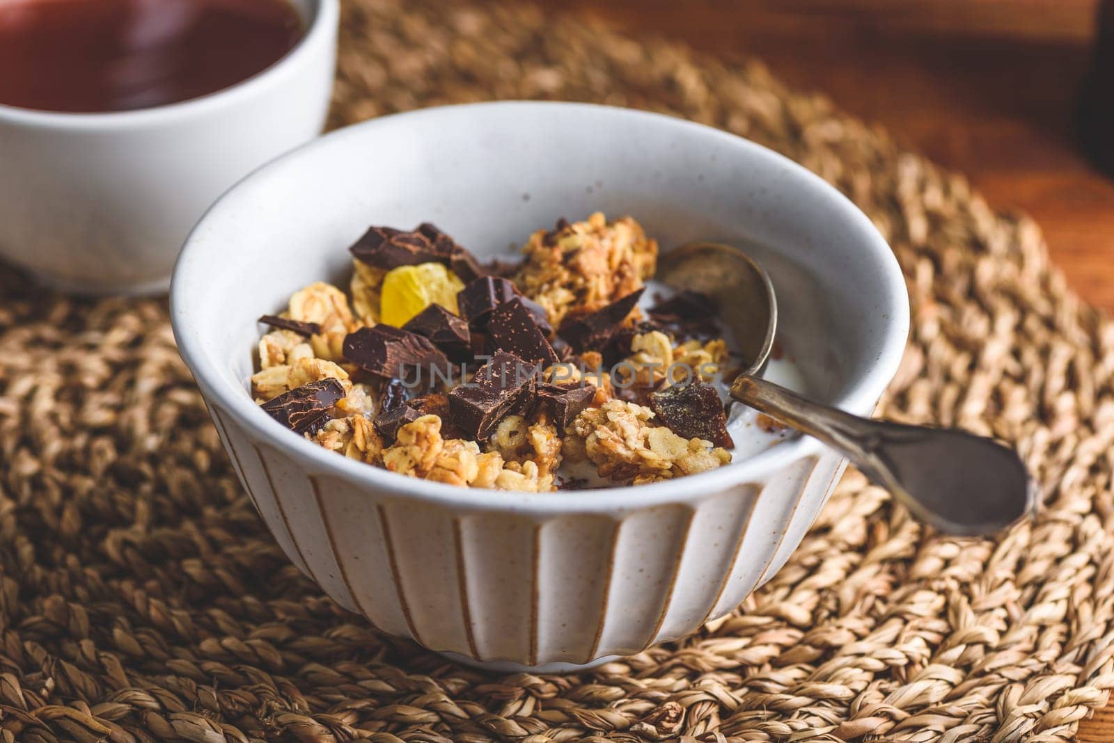 Breakfast Bowl of Granola with Dried Fruits and Crushed Chocolate by Seva_blsv