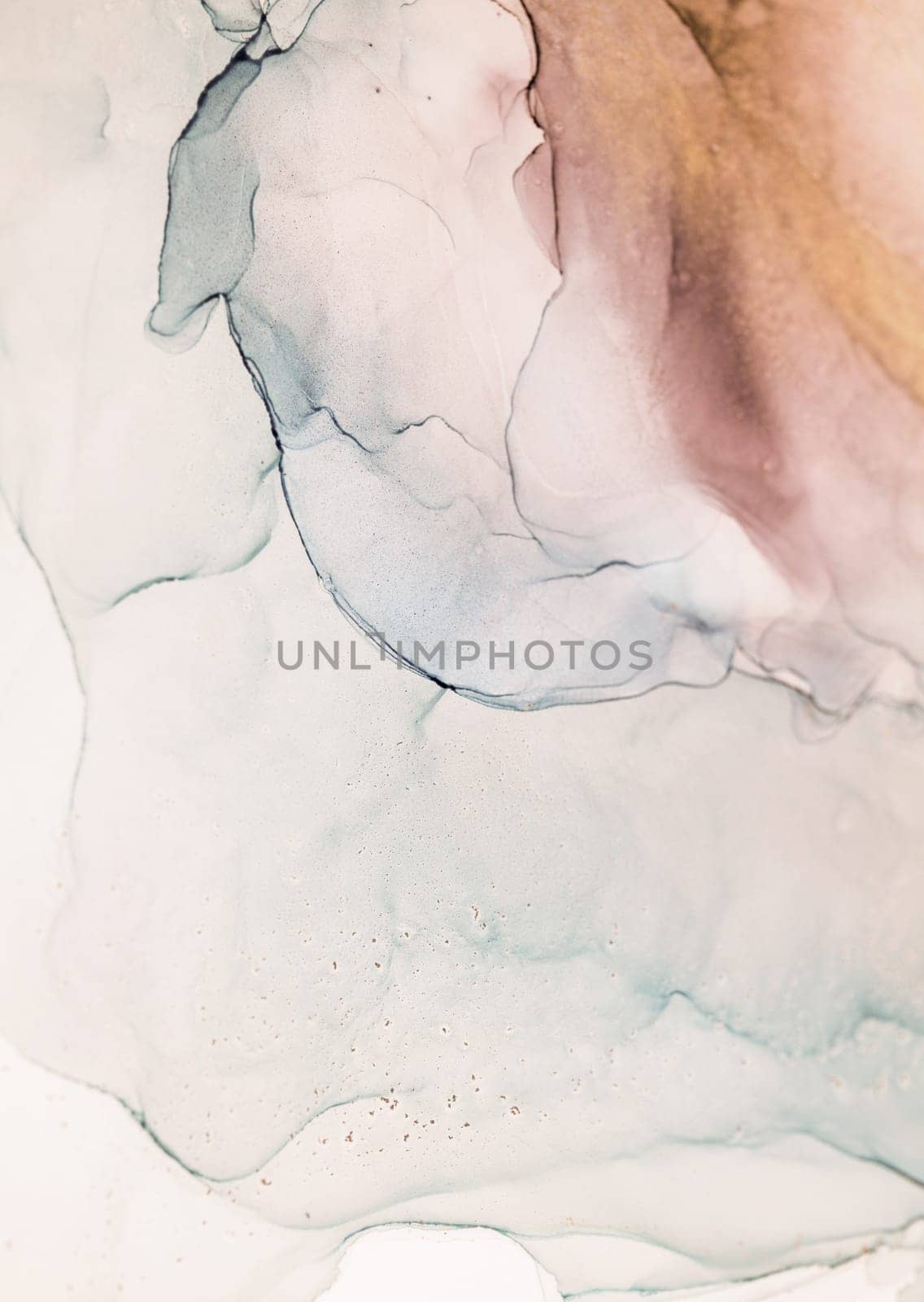 A close-up image of abstract ink swirls in earthy tones of brown, grey, and white. The ink is flowing and mixing, creating a dynamic and artistic composition.