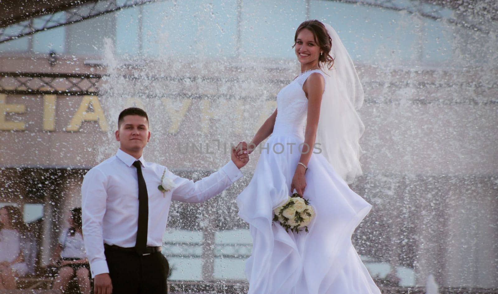 Bride and groom holding their hands by VeronikaAngo