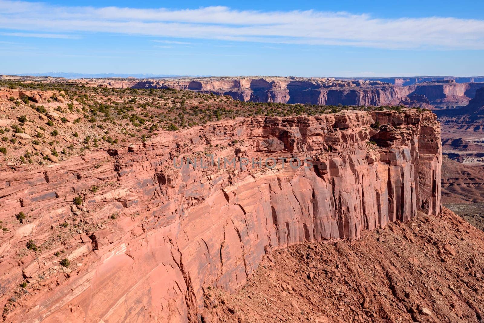 Stunning cliff landscape from Grand View Point in Canyonlands National Park, Utah. The majestic red rock formations and expansive canyon views showcase the rugged beauty of the Southwest - USA