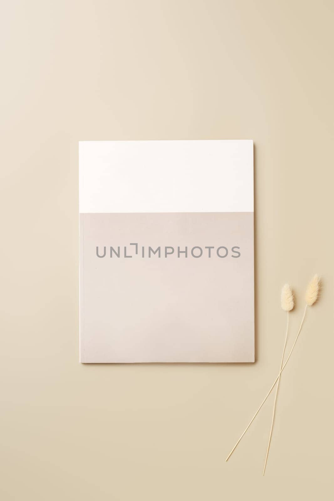Stack of blank paper on beige background copy space