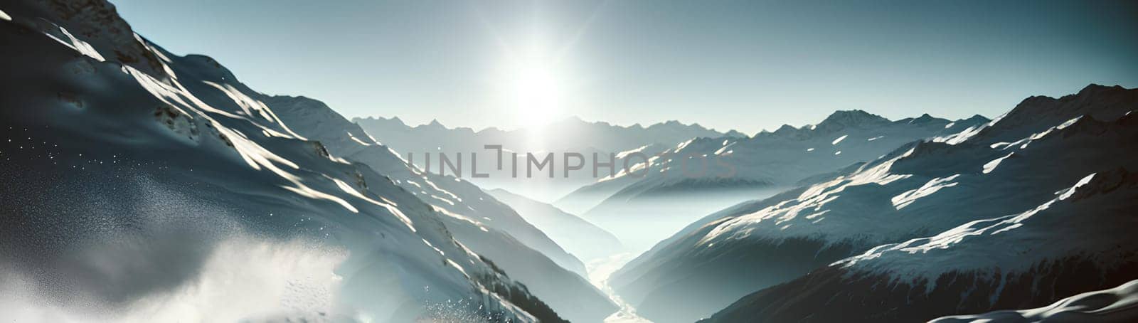 Snow-capped mountain peaks in sunlight, horizontal panorama.