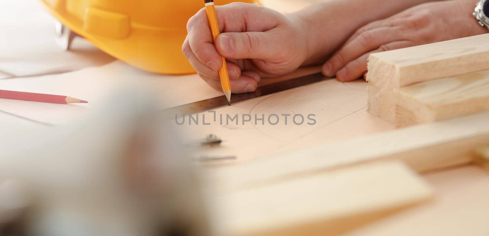 Arms of worker measuring wooden bar portrait. Manual job DIY inspiration improvement job fix shop yellow helmet joinery startup workplace idea hard hat career ruler industrial education