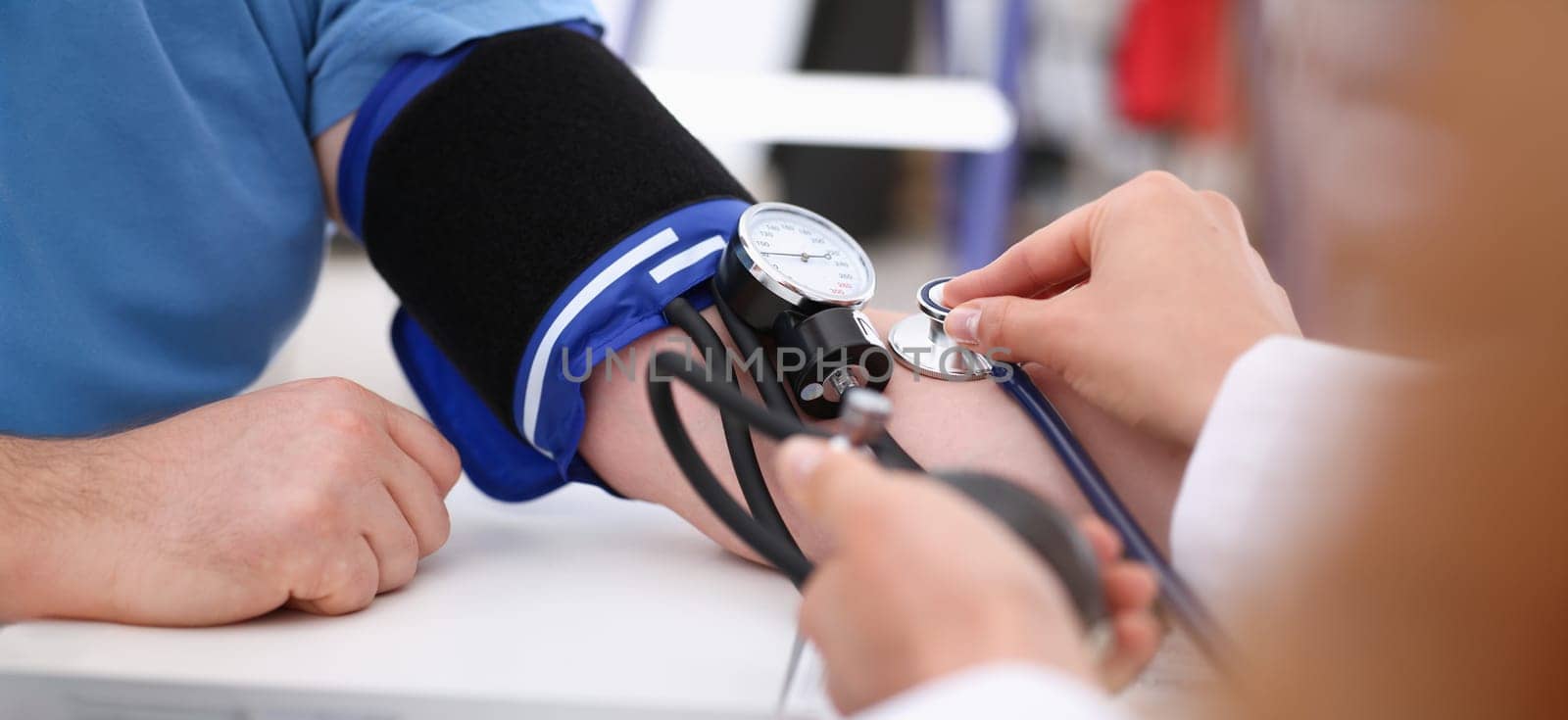 Female doctor arms make medic procedure closeup. Physical cure arterial beat exam tool nurse control and consult healthy lifestyle diagnosis therapeutist practice heal problem reception concept