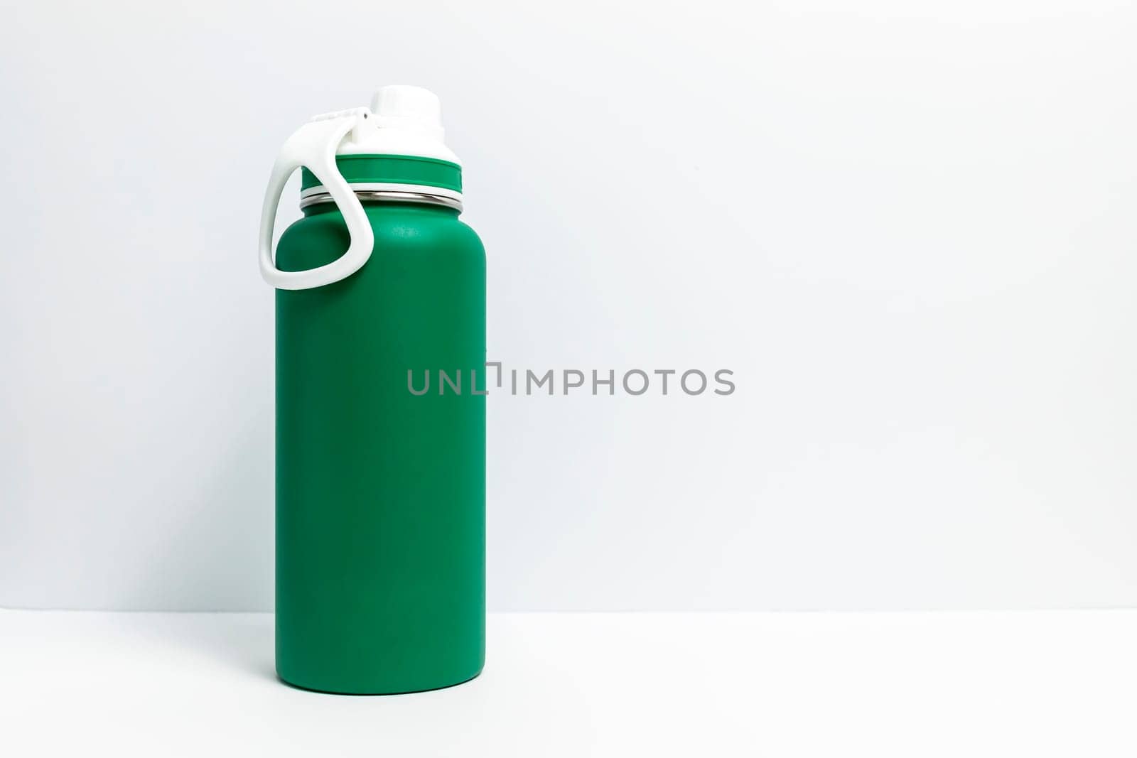 Backdrop Reusable Sport Green Water Bottle, Protein Shaker On White Gray Background. Copy Space For Text. Tumbler, Product Template. Horizontal Plane