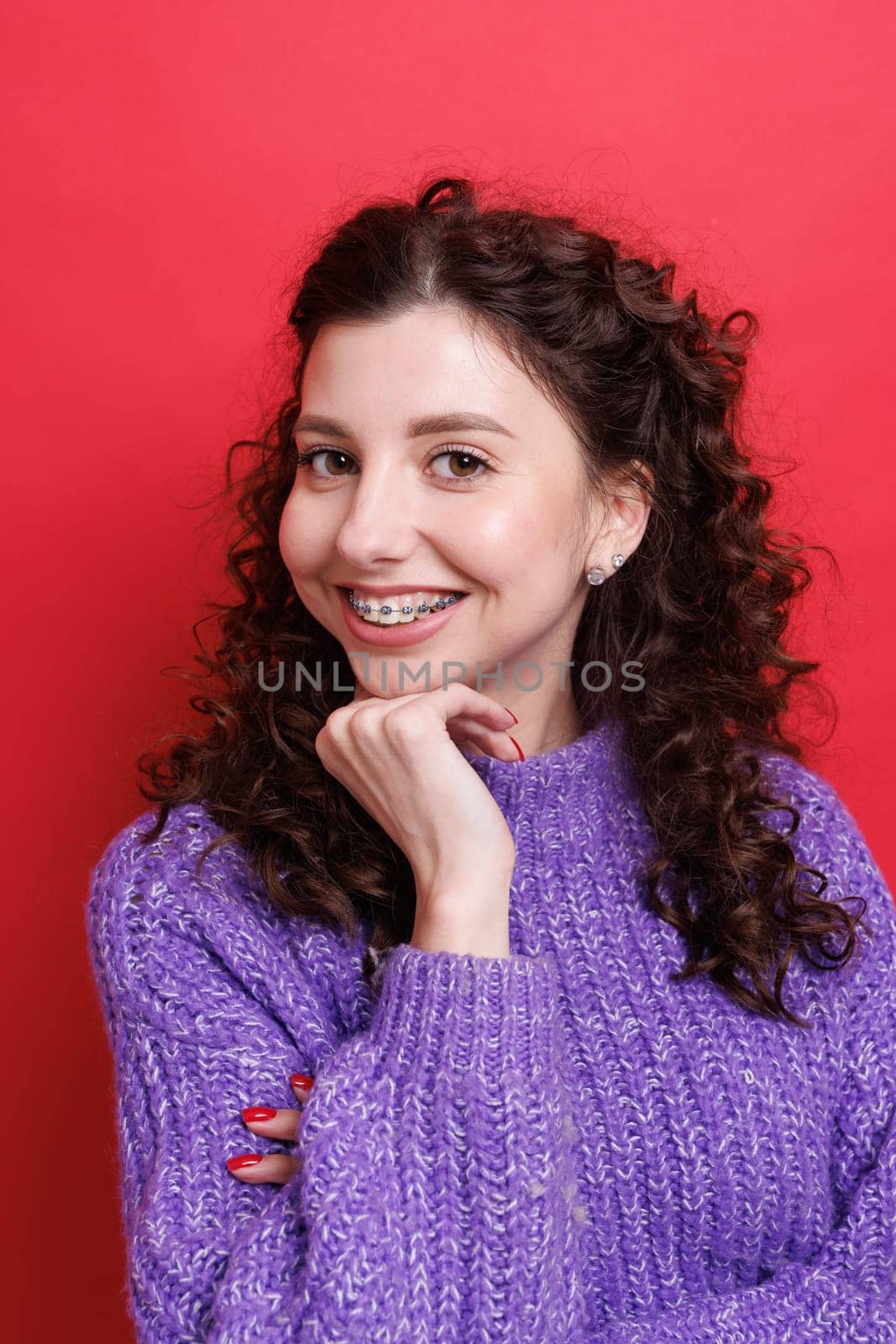 portrait of a girl with braces close-up, woman is happy with braces, beautiful teeth concept