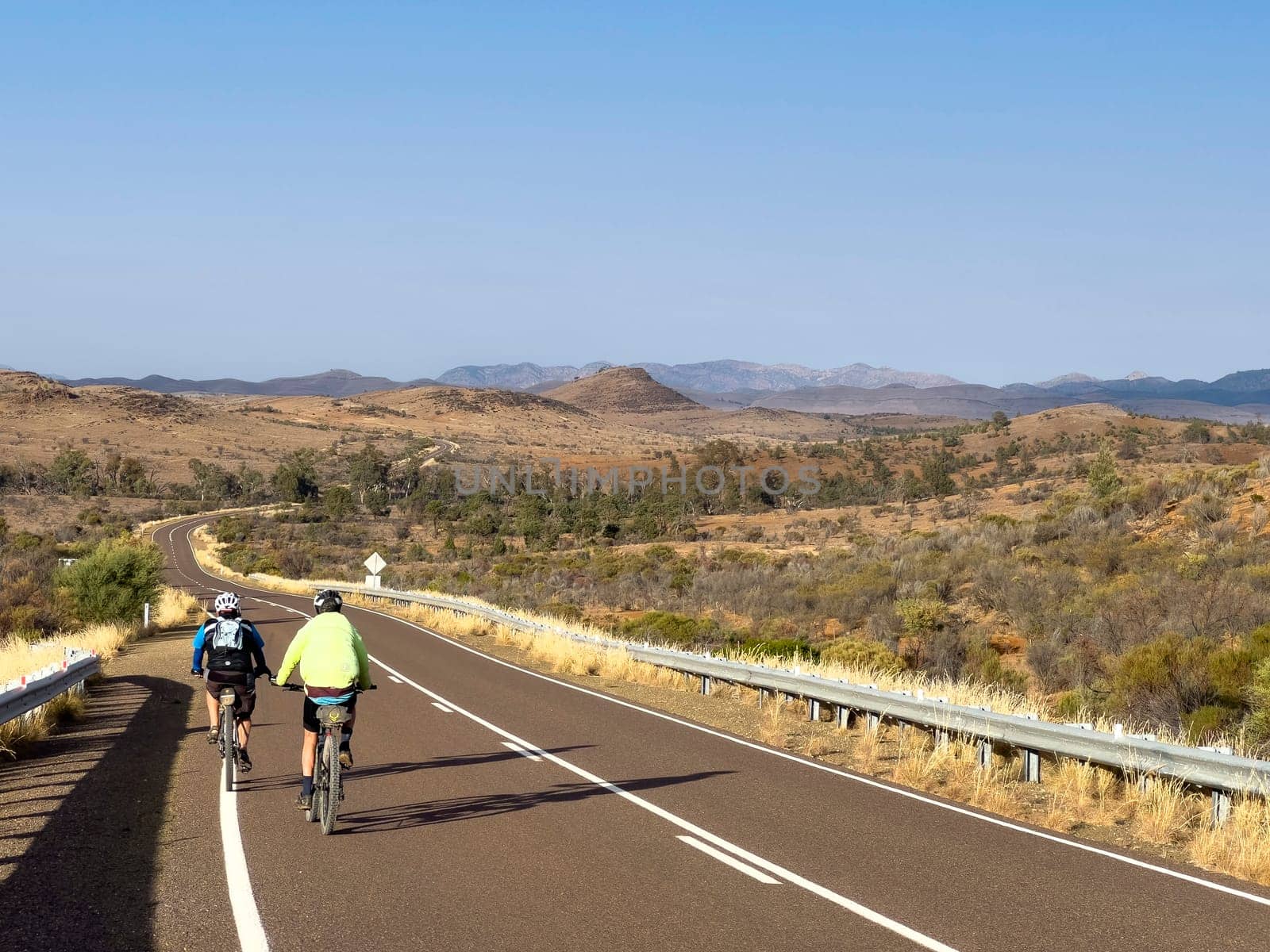 Cyclist Exploring Scenic Flinders Ranges Road by berzans