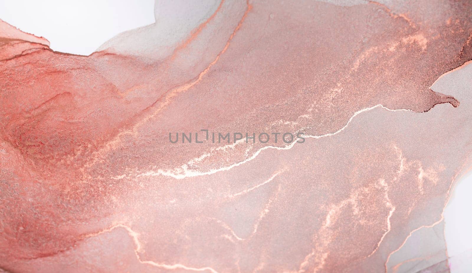 A close-up abstract art image showcasing delicate, flowing lines of rose gold ink on a white background, creating a captivating and ethereal design.