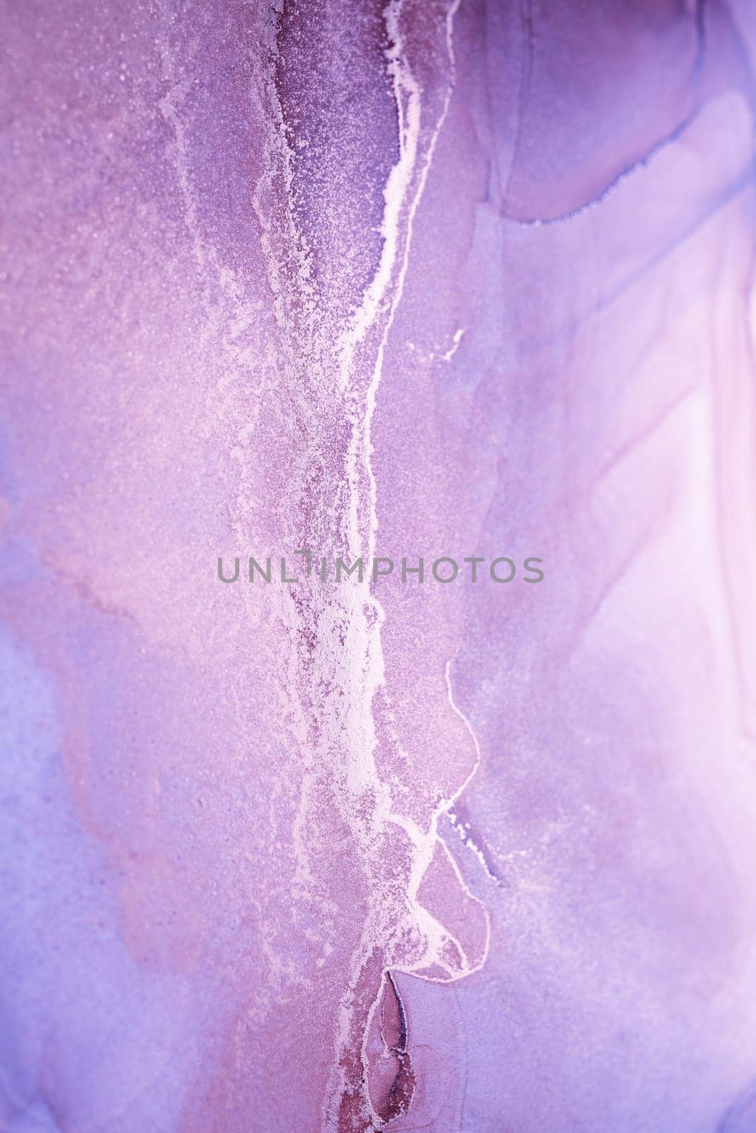 A close-up abstract image featuring a vibrant lavender background with swirling patterns of silver metallic paint.