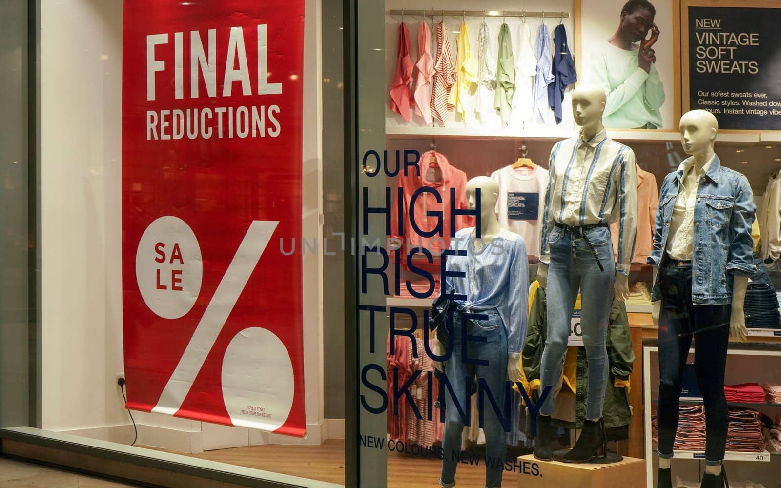 London, United Kingdom - February 01, 2019: Final reductions sale sign at fashion store window. Goods are usually reduced in price beginning of year, after Christmas season