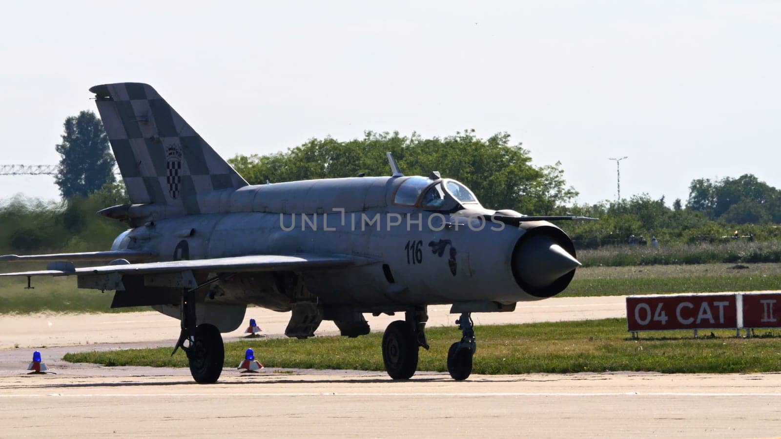 Zagreb Croatia May 11 2024: Combat aircraft taxiing on runway. Copy Space. Mikoyan Gurevich MiG-21 Fishbed of Croatian Air Force.