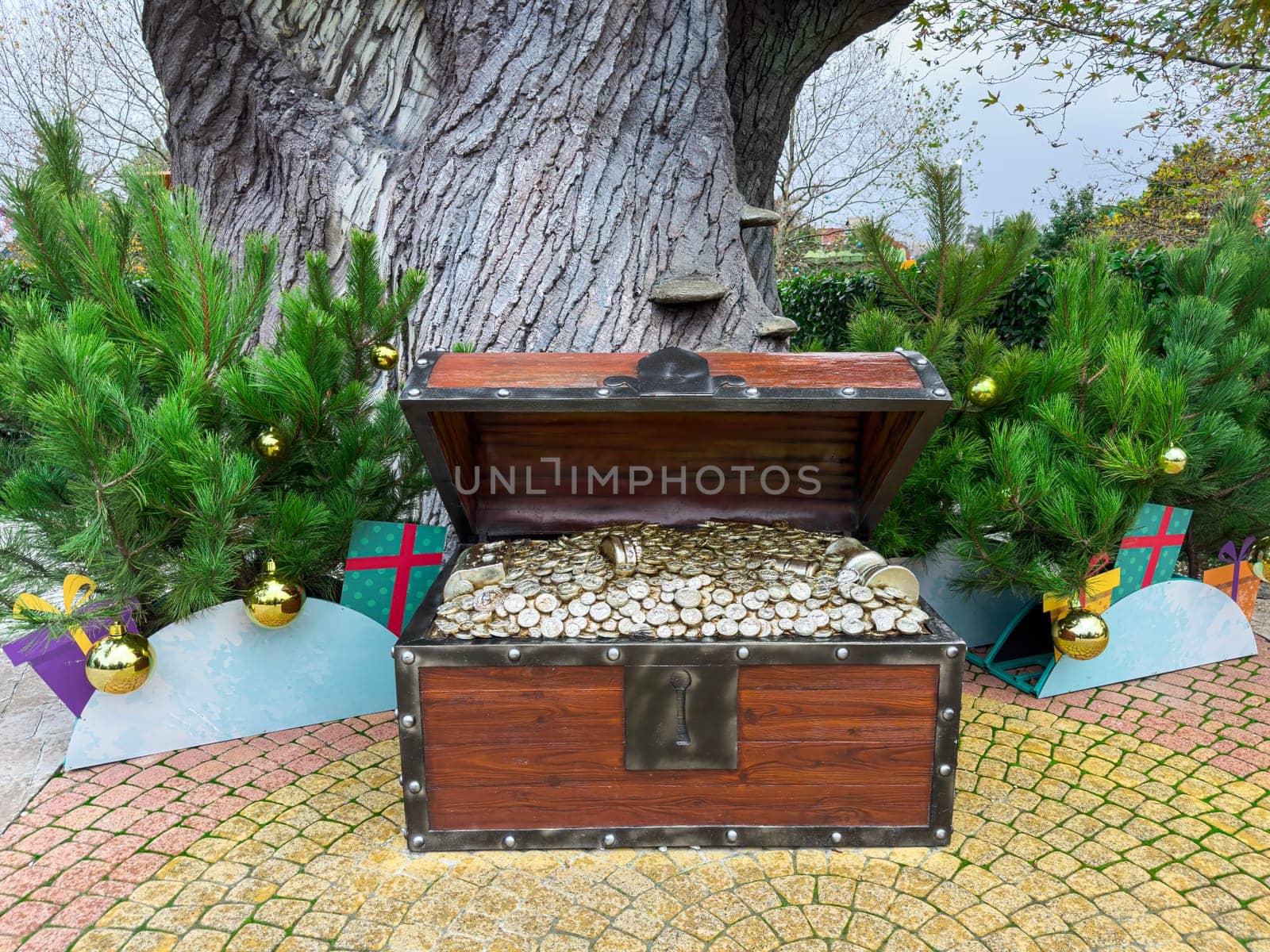 A treasure chest filled with Christmas decorations. photo