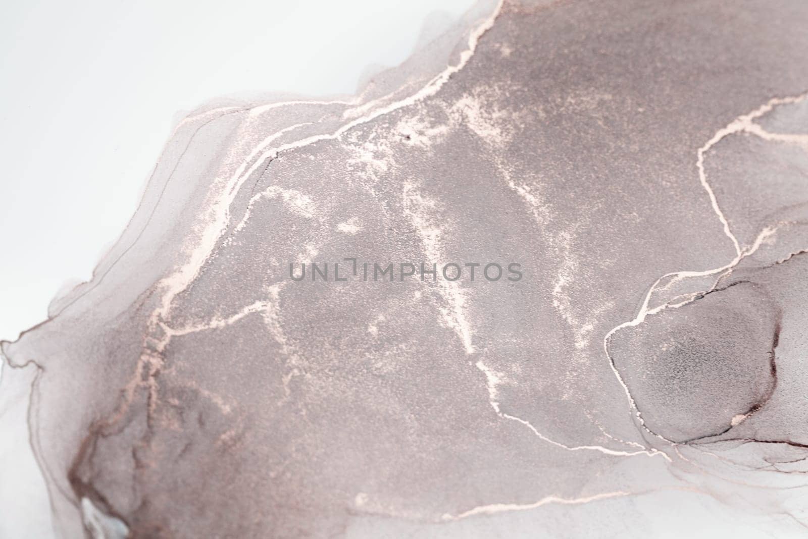 A close-up image of a swirling abstract art piece featuring shades of grey and white. Delicate lines and shapes create a sense of movement and depth.