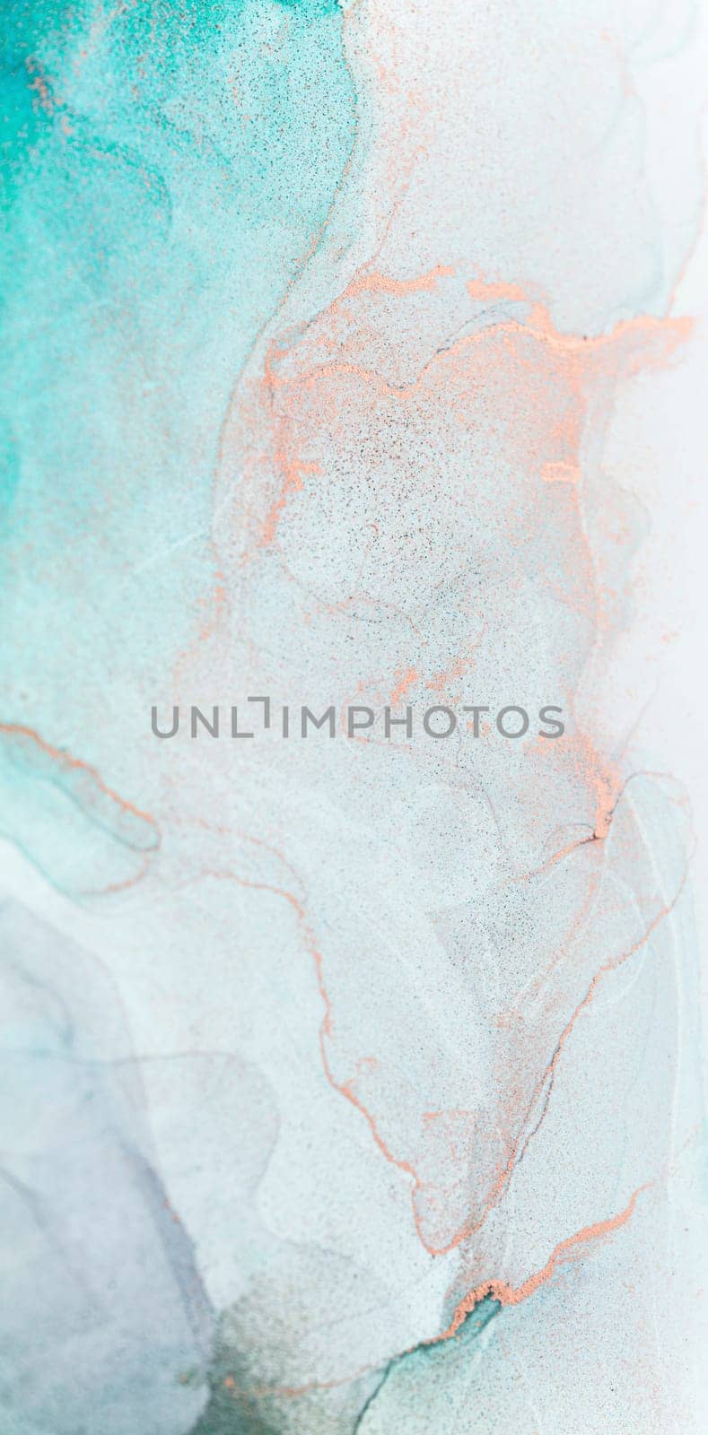A close-up image of teal and white ink swirling together, creating a beautiful abstract pattern.