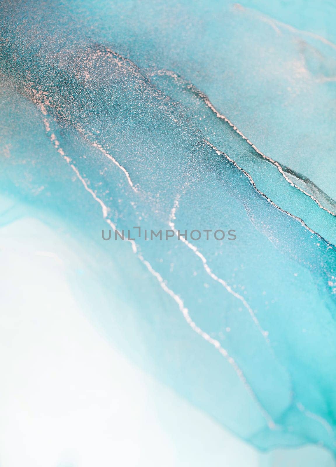 An abstract image featuring a close-up of teal and silver swirls, resembling water flowing in a river or stream.