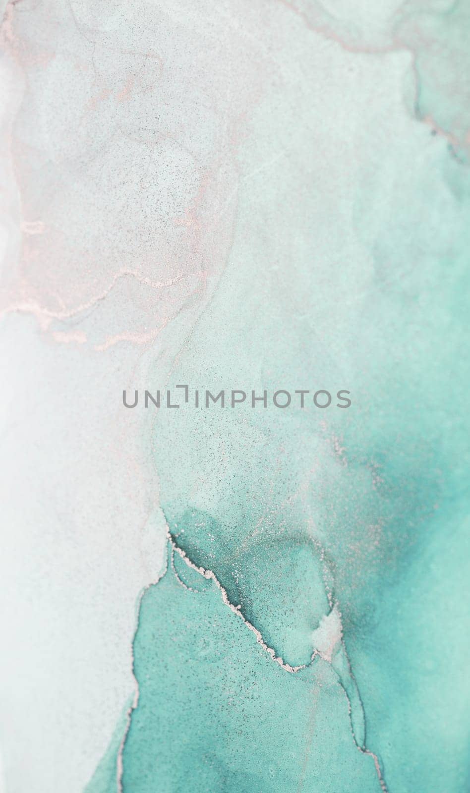 A close-up shot of an abstract watercolor painting featuring a blend of cool mint green and white hues. The colors swirl and flow, creating a dynamic and artistic composition.