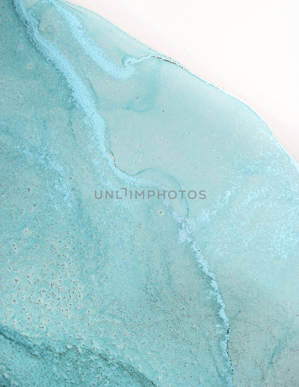 A close-up image of an abstract watercolor painting with teal swirls and veins against a white background.