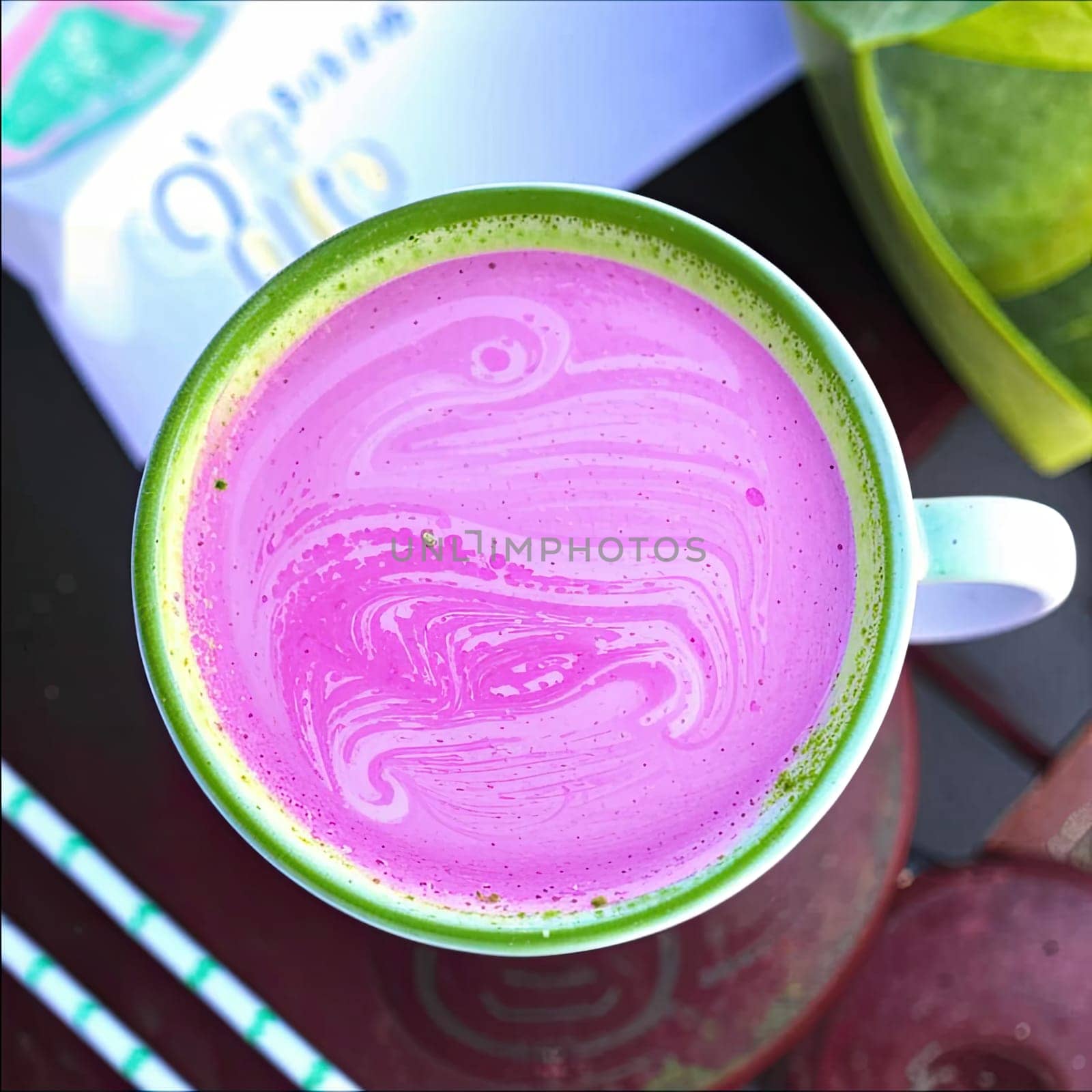 Photo of pink matcha from bright dragon fruit powder. It is rich in vitamins and minerals. Sweet taste reminiscent of a mixture of strawberries and kiwi.