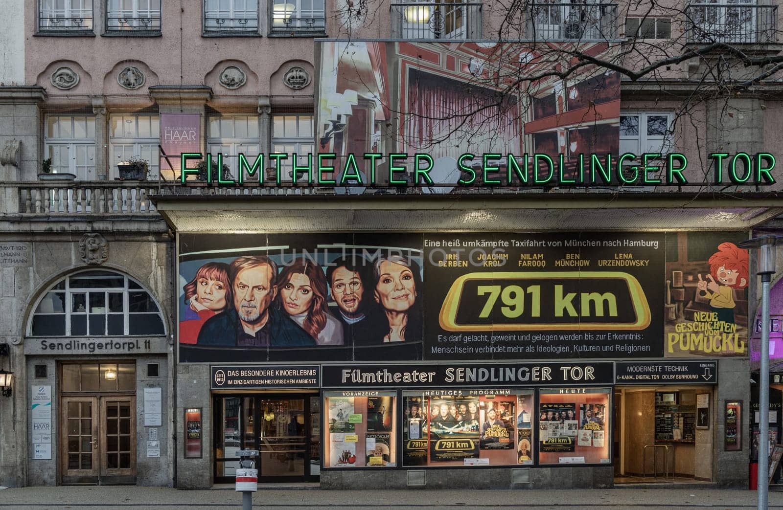 Munich, Germany - Dec 21, 2023 - Exterior architecture design of Filmtheater Sendliger Tor, Cinema of central Munich, Historical film theater from 1913, Space for text, Selective focus.
