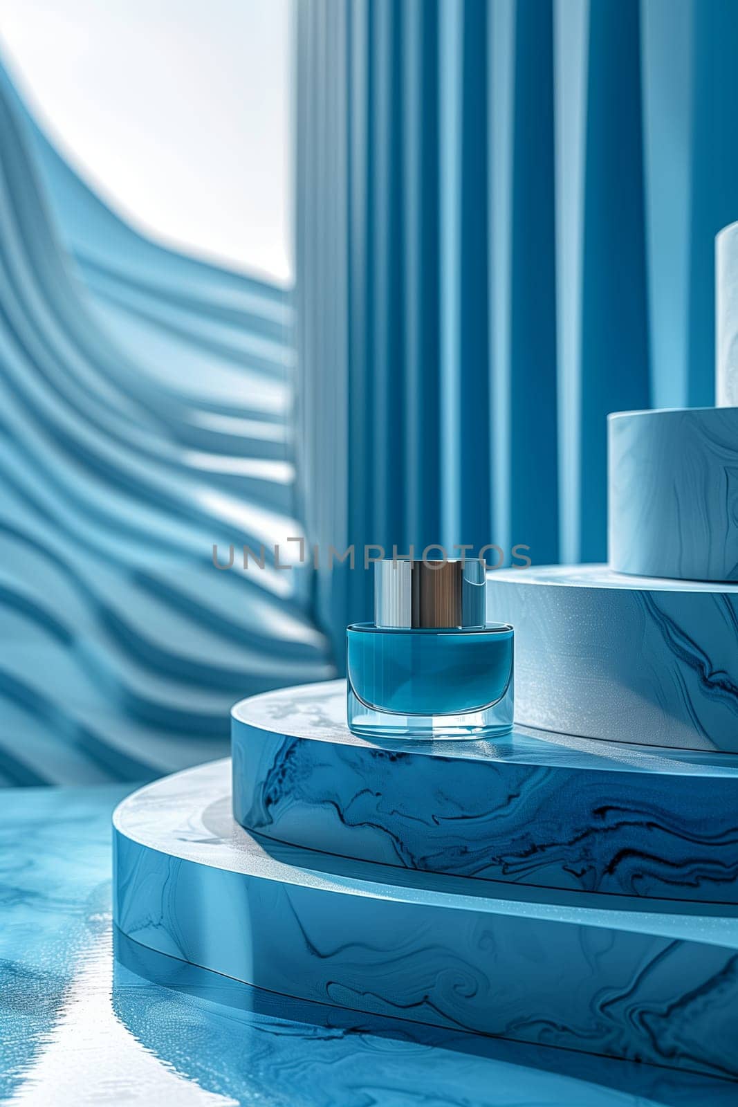 A blue glass bottle with a silver lid sits on a circular, blue marble platform. The platform is part of a larger, multi-level platform structure in an otherwise empty, blue room. The rooms walls are composed of vertical, blue strips.