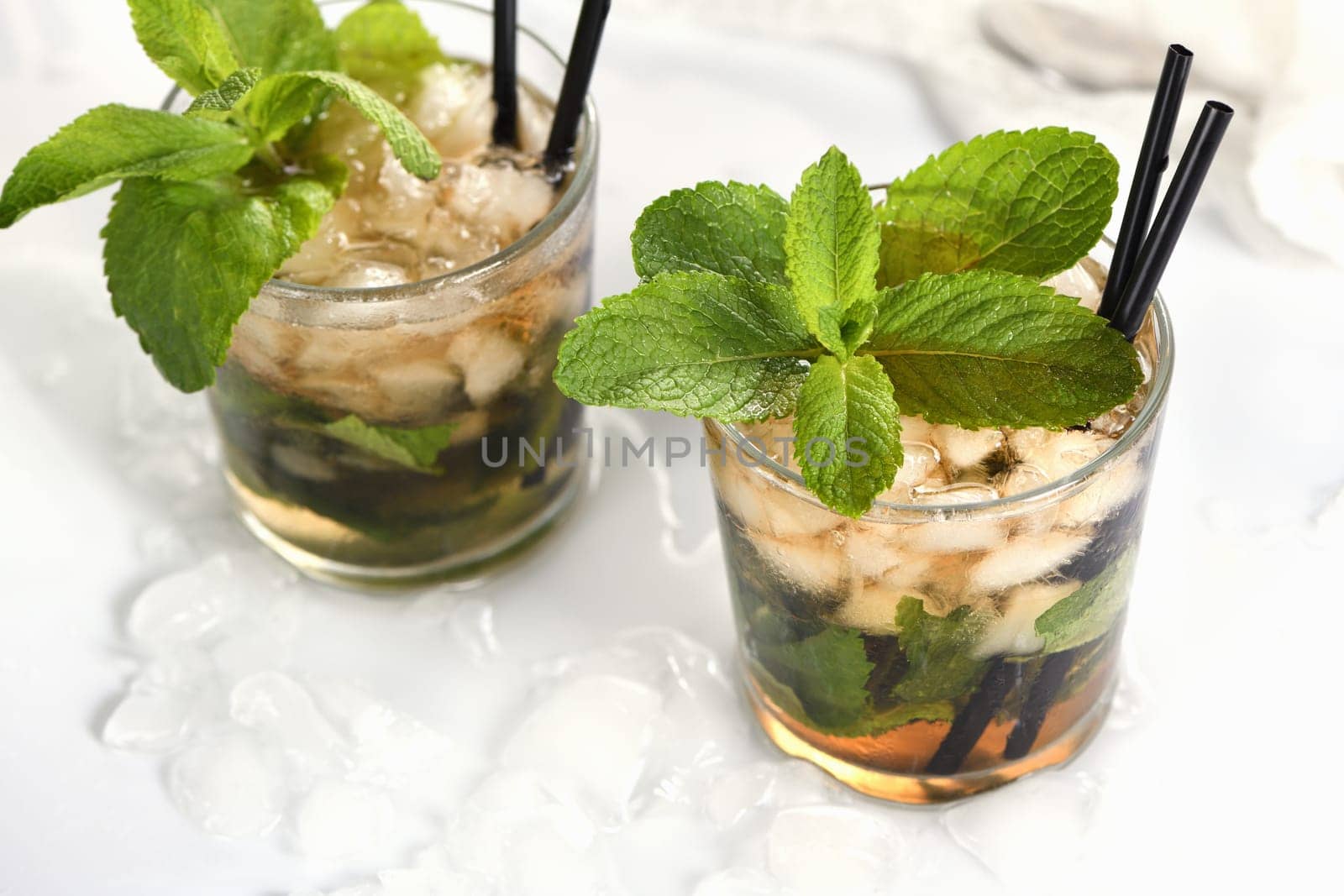 A refreshing mint julep cocktail. Made with bourbon, fresh mint and a hint of sweetness, this is the perfect drink for summer gatherings.