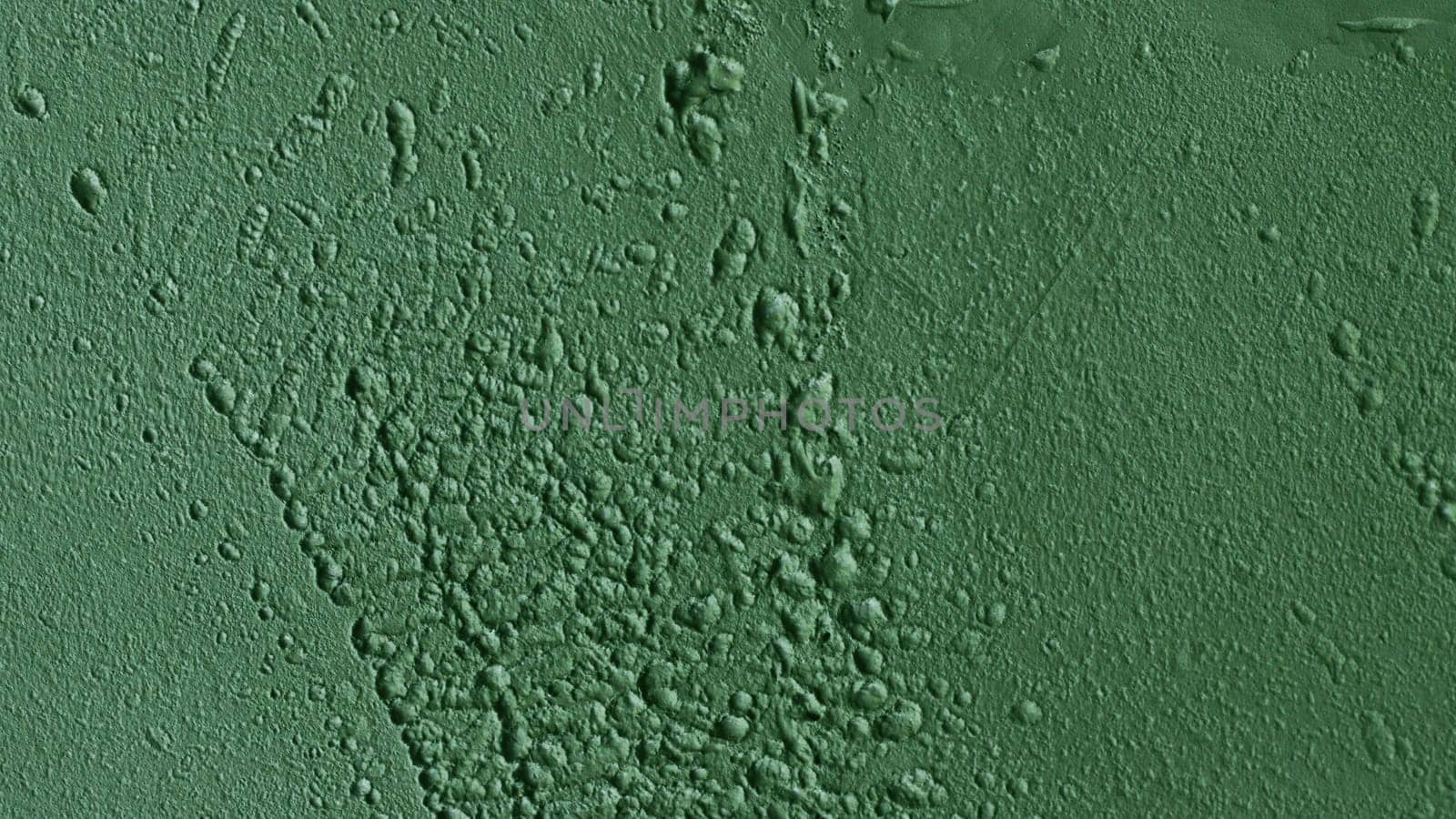 Texture of a metal plate painted green. Texture for design with copy space.