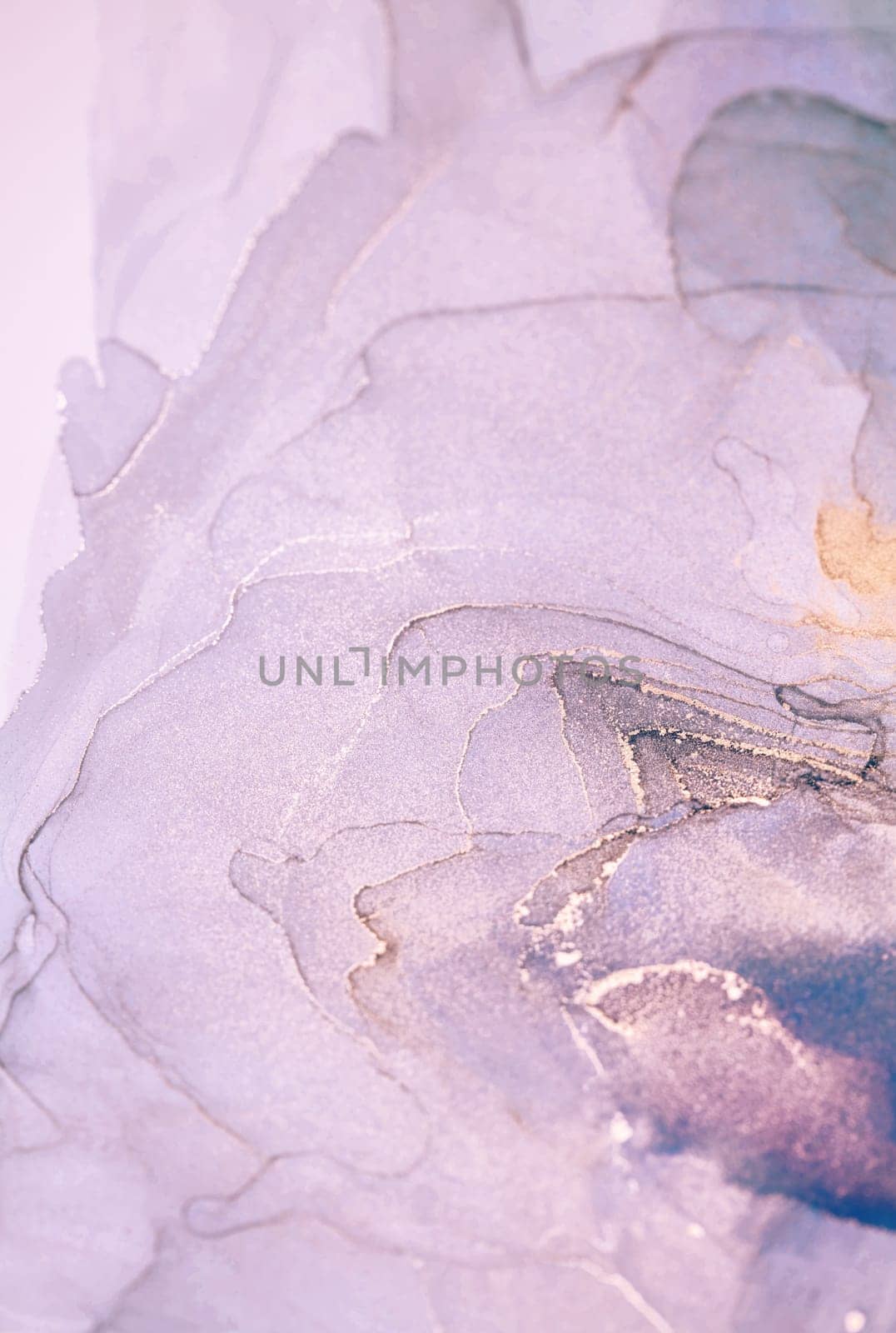 A close-up shot of abstract art created with swirling lavender and silver ink, creating a mesmerizing dreamscape.