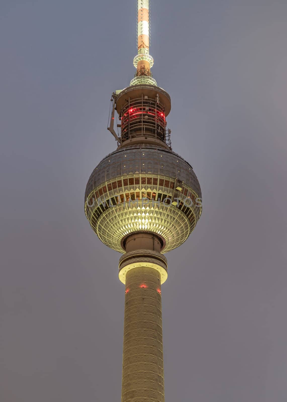 Berlin, Germany - Dec 18, 2023 - Famous Berlin Television Tower (Fernsehturm) with night sky background near Alexanderplatz in Berlin, A Tourist attraction and Meeting place, Copy space, Sective focus.