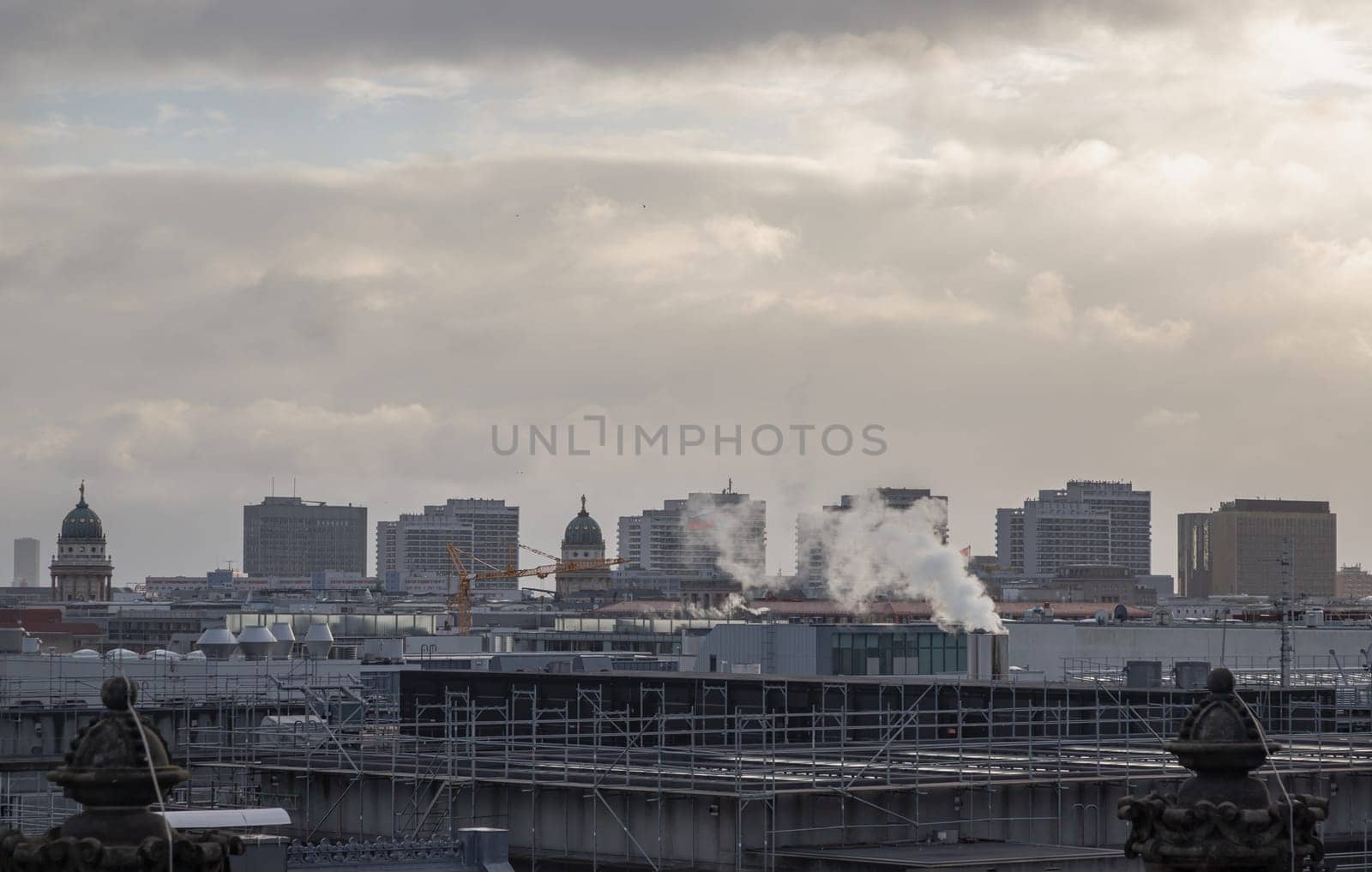 Berlin, Germany - Dec 20, 2023 - Berlin cityscape view from above of Reichstag building with Gendarmenmarkt twin churches and highrise buildings at the downtown Berlin. a major tourist attraction of the berlin city, Space for text, Selective focus.
