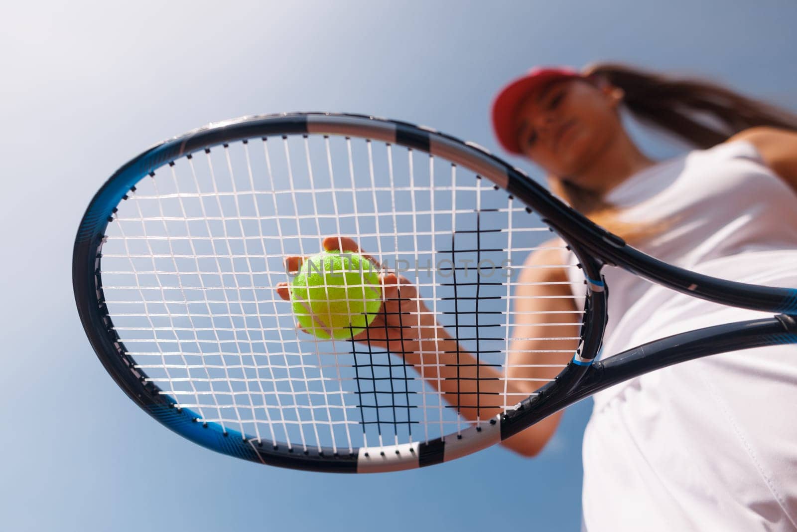 young woman playing tennis on the tennis court, olympic sport, outdoor activity concept