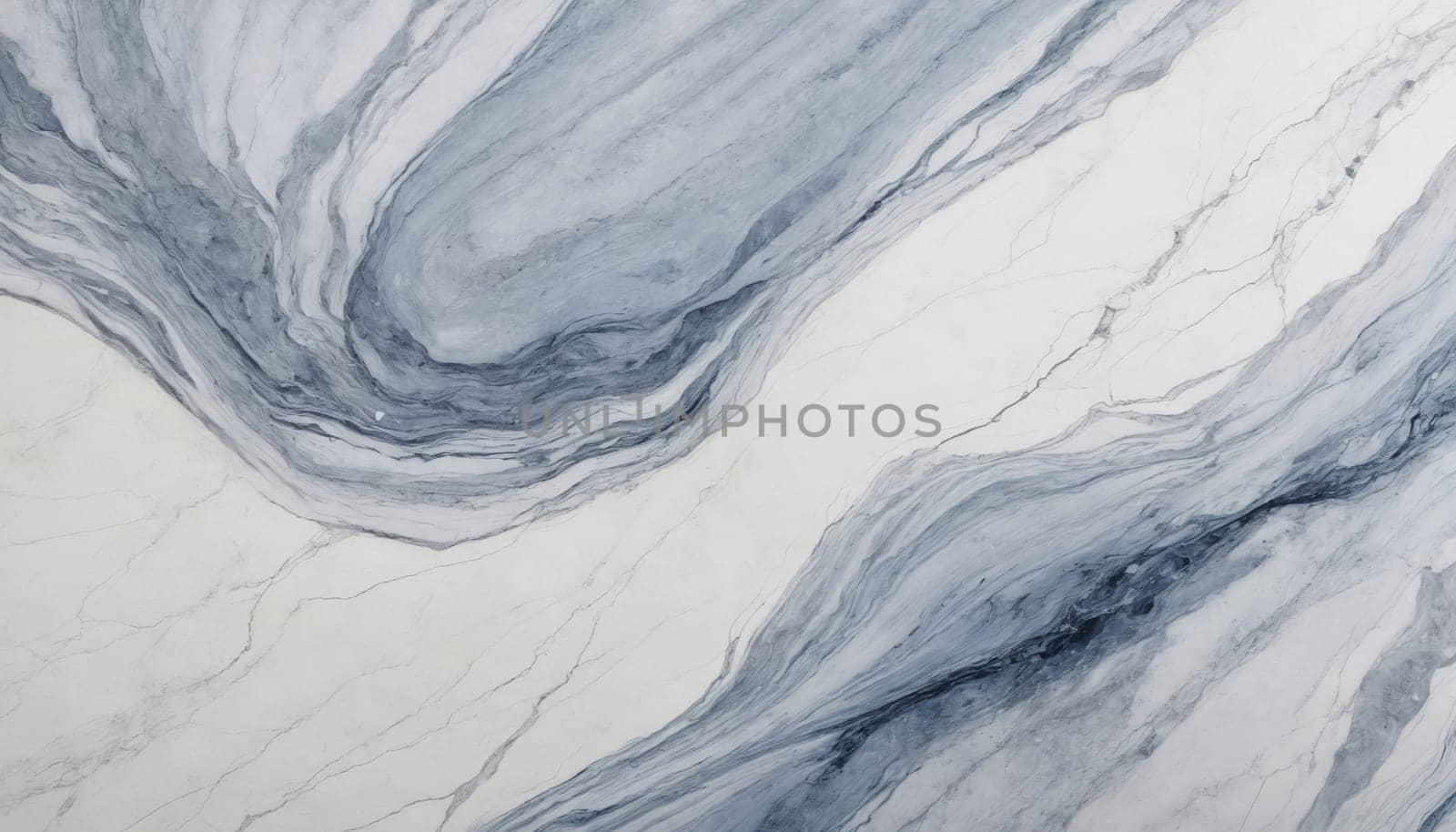 A close-up view of a light grey and white marble surface. The marble has a swirling pattern of thin, dark grey veins that create a dynamic and abstract design. The background is a light, creamy white, providing a contrast to the darker grey veins.