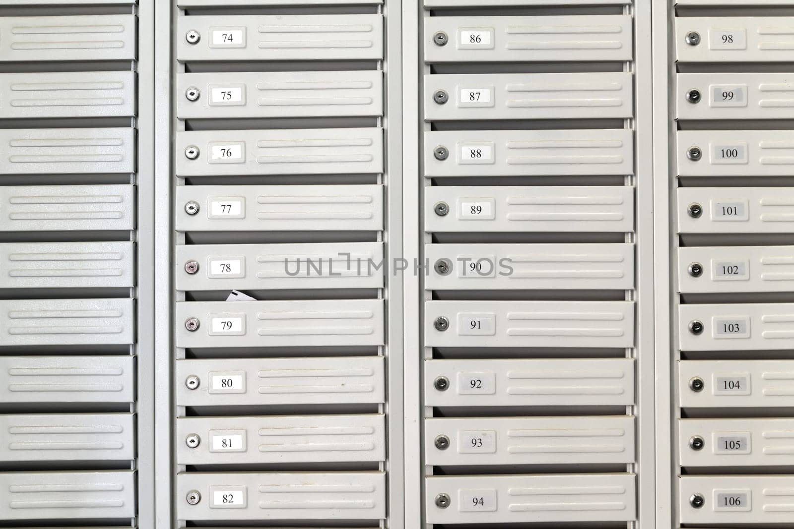 mailboxes in the interior of entrance group of residential high-rise building, Russia