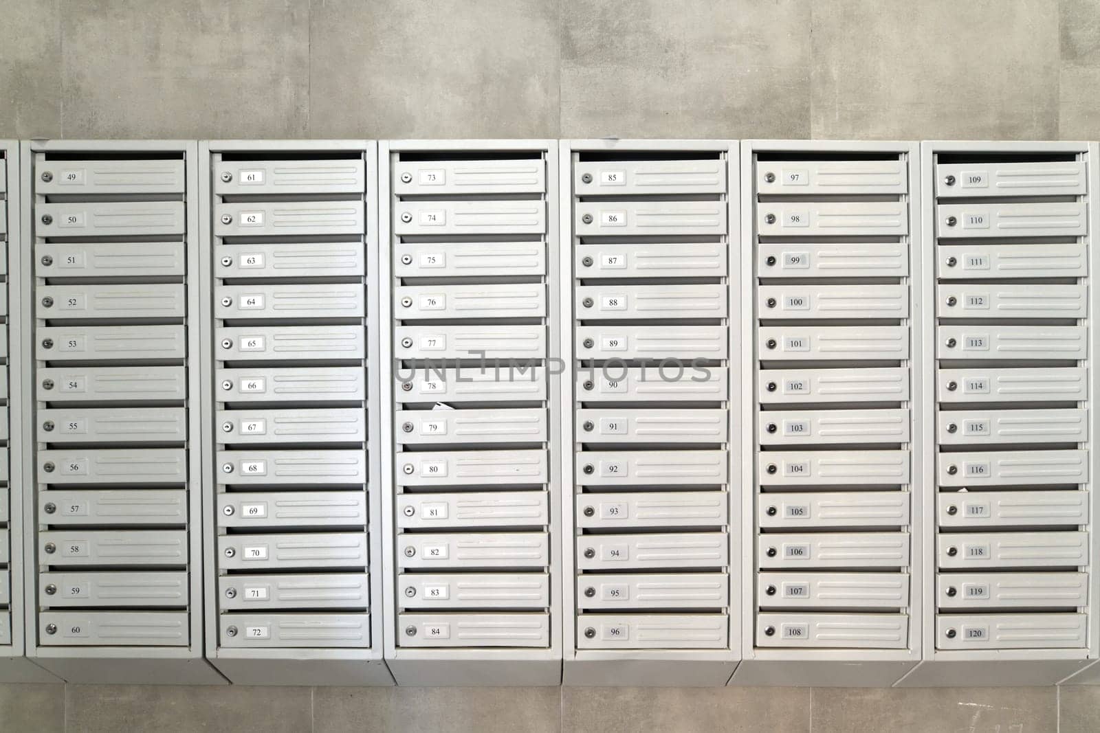 mailboxes in the interior of entrance group of residential high-rise building, Russia