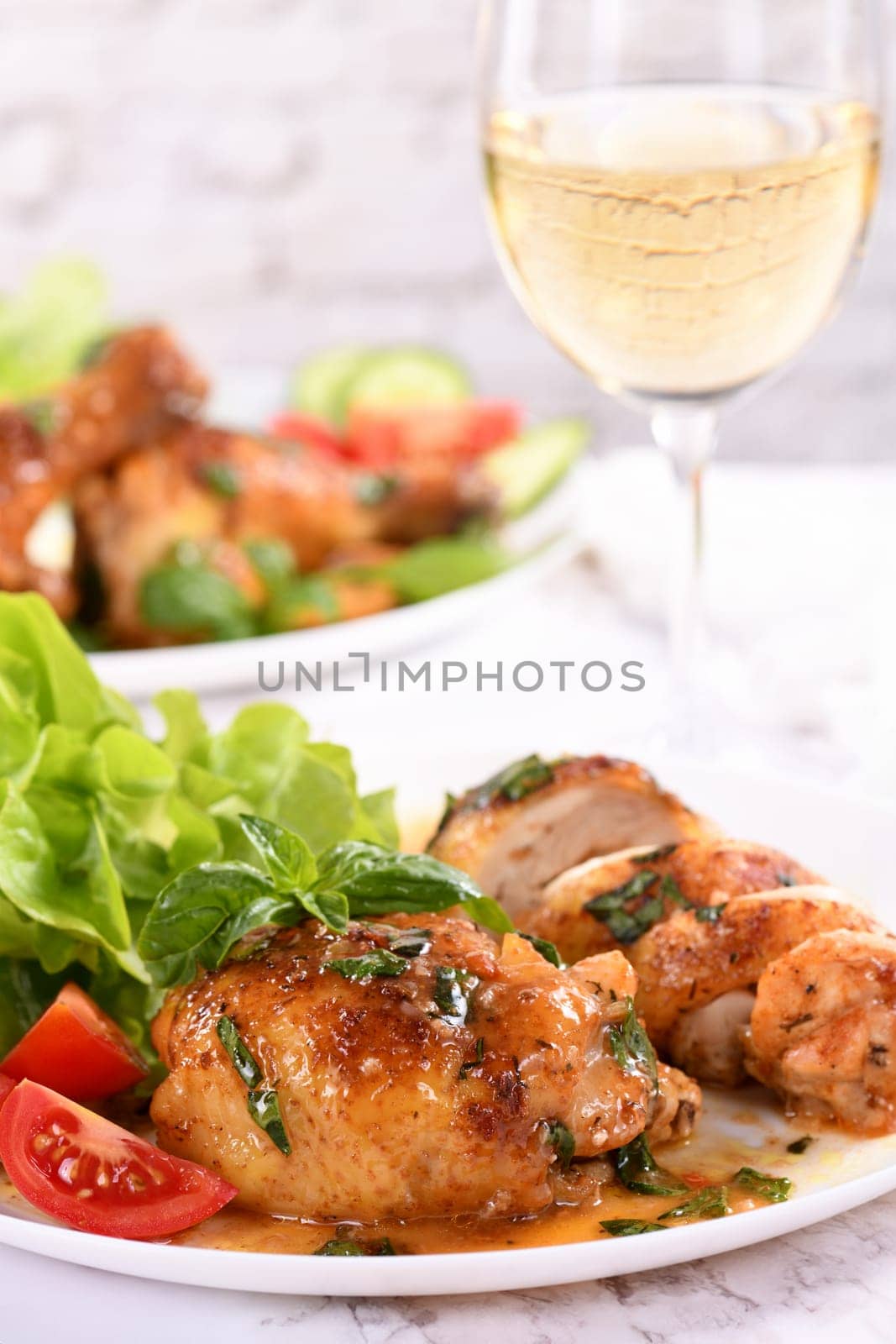 Chicken thigh with gravy and vegetable side dish