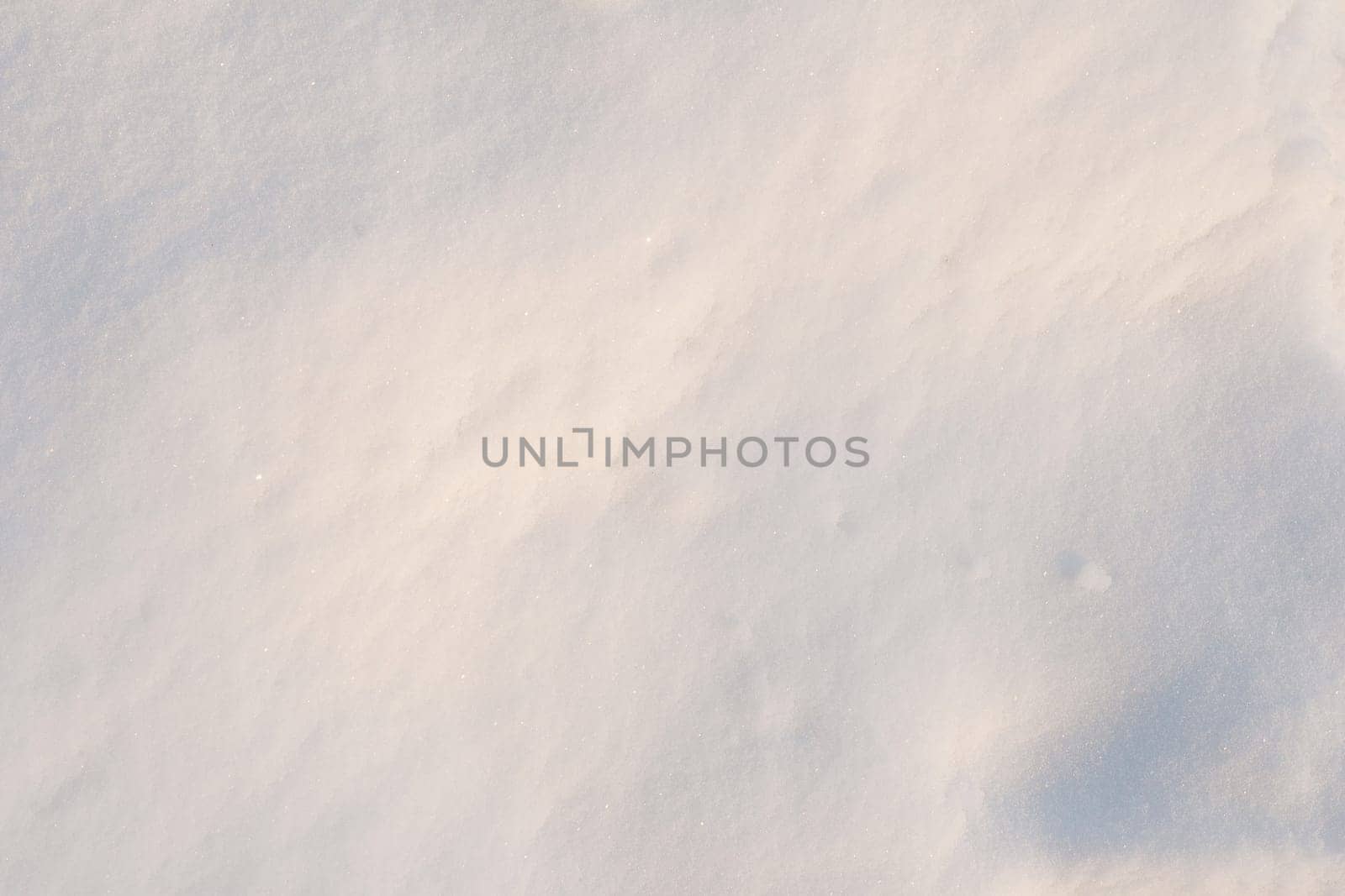 Close-up of fresh snow on a sunny day.