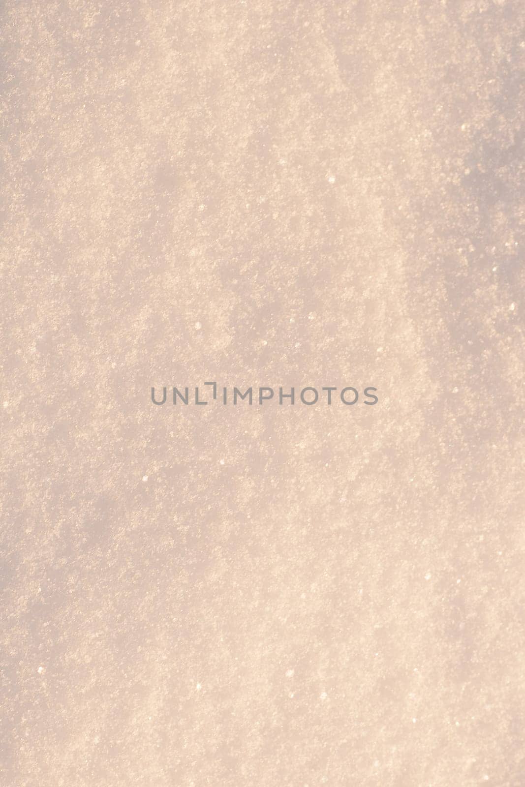 White frost snow toned in blue background.