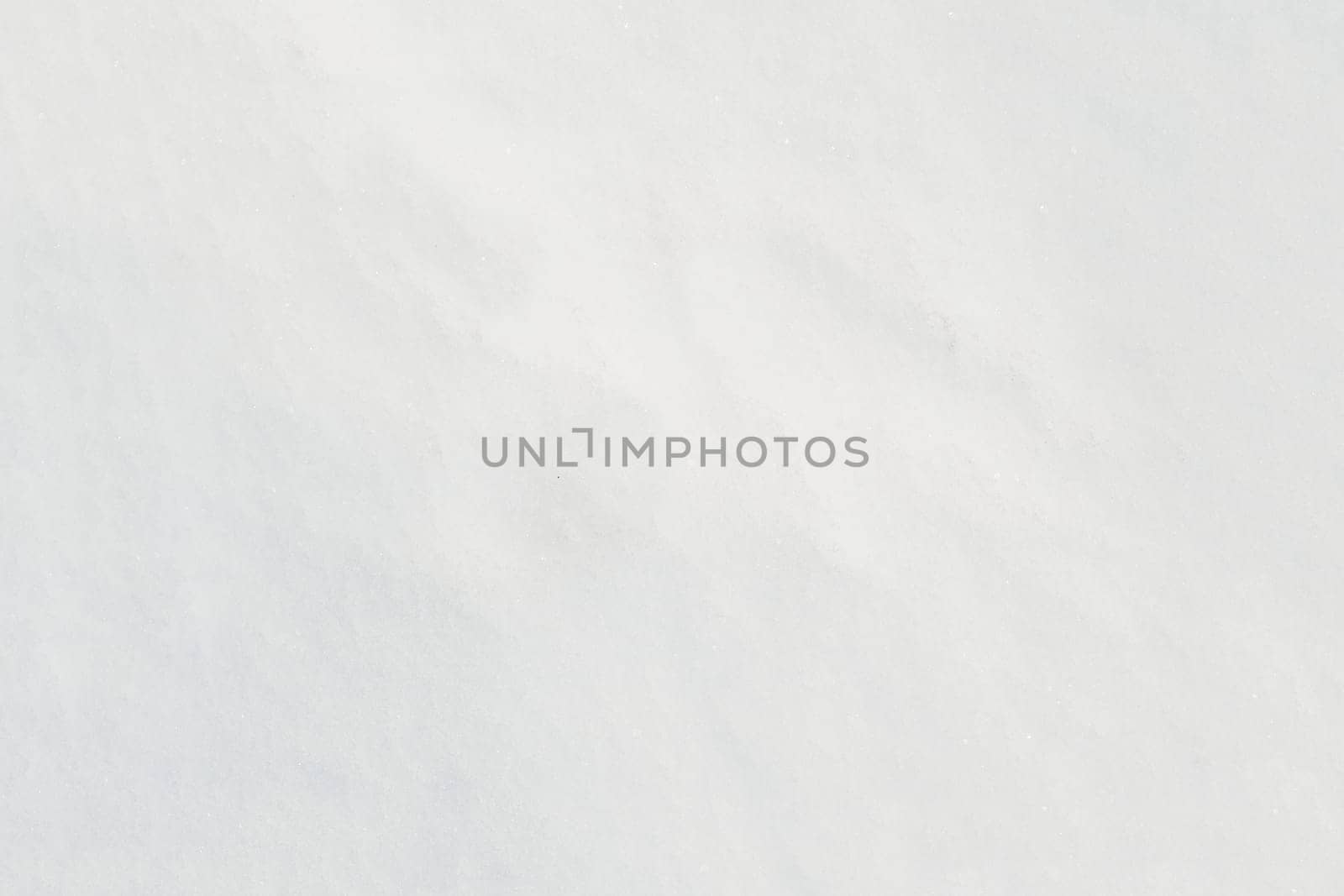 White frost snow toned in blue background.