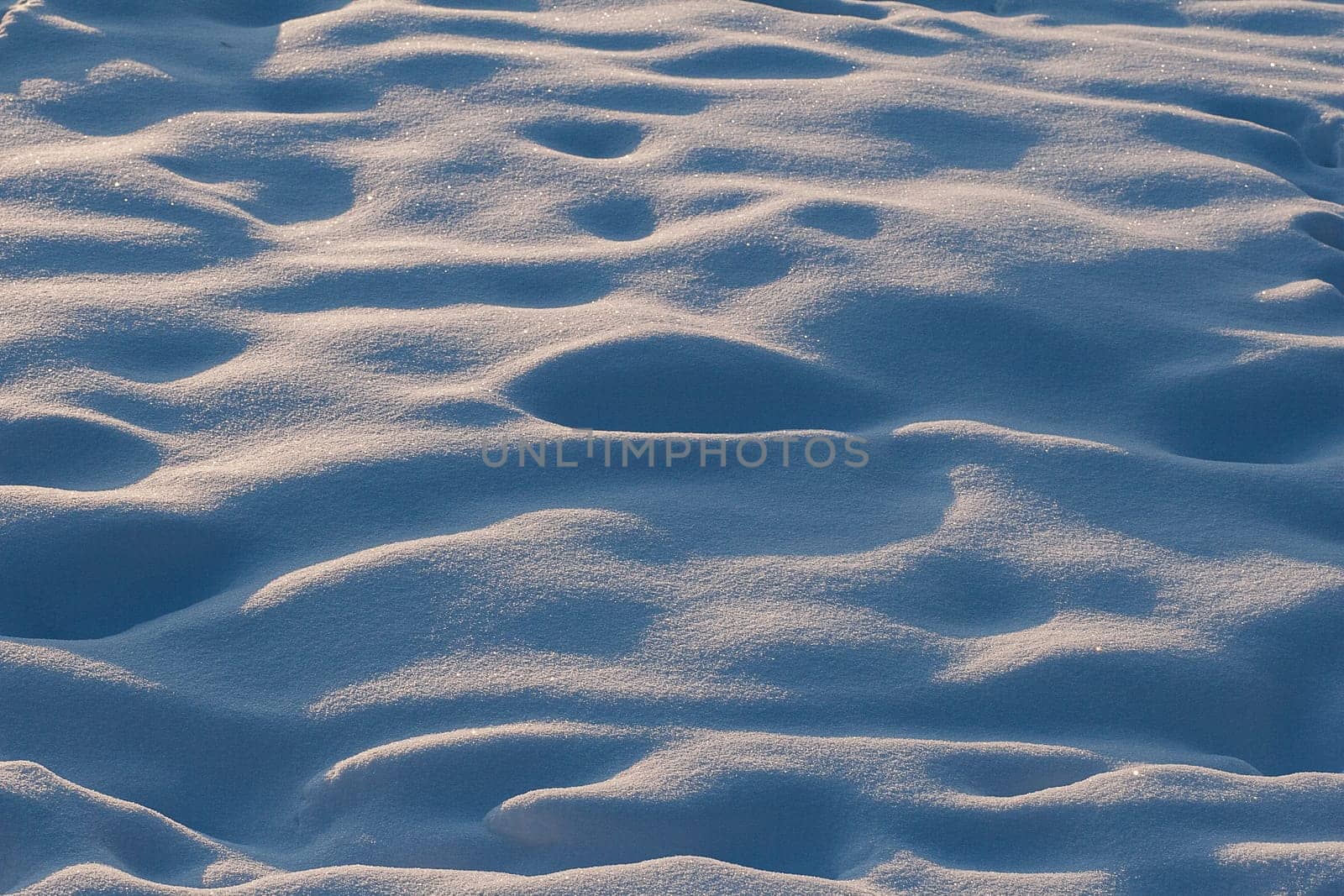 Scenic view of snow covered land.