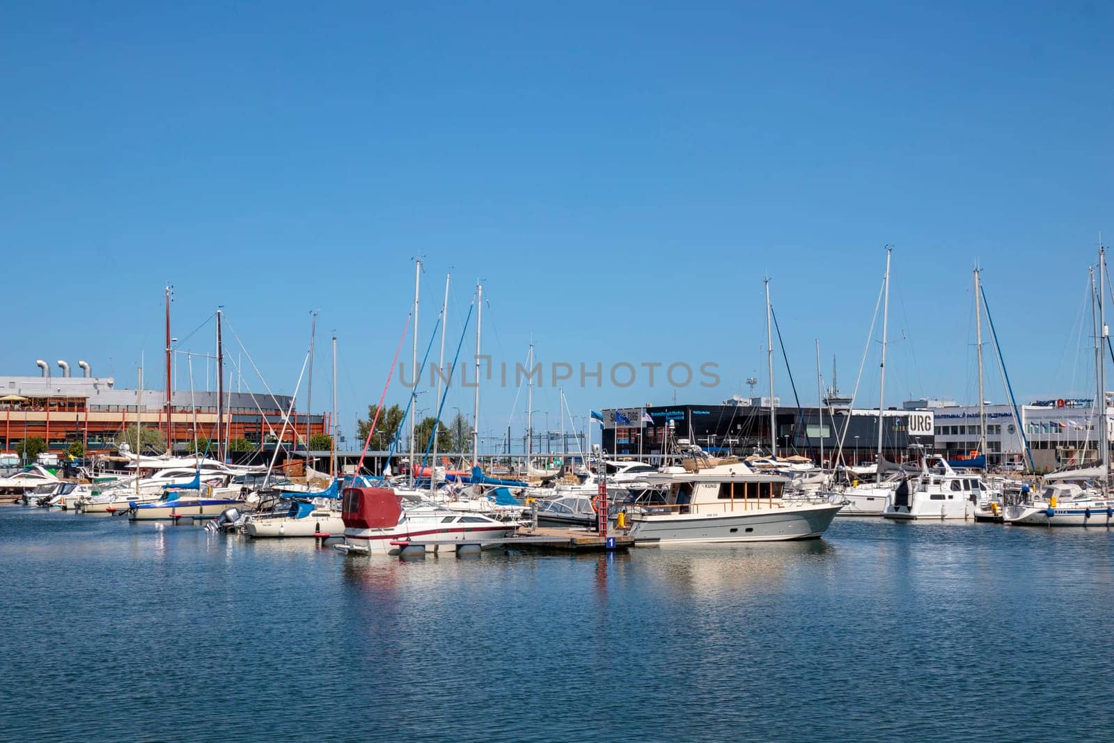 Noblessner, Tallinn, Estonia - June 29, 2024 - Marina with sailboats moored on a finger pier in sunny day