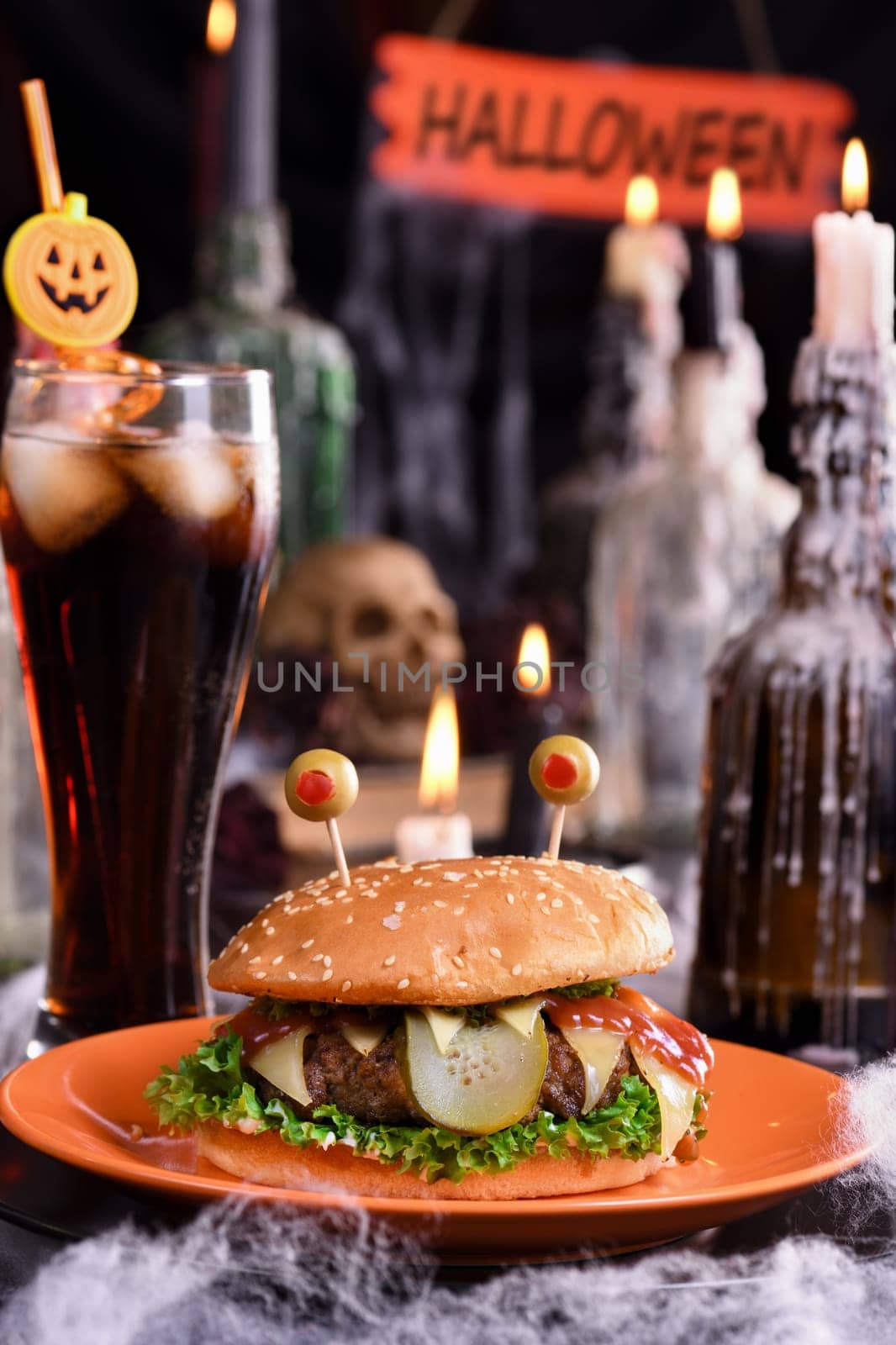 The Monster Burger will definitely lift your spirits and is the perfect snack for a Halloween party.
