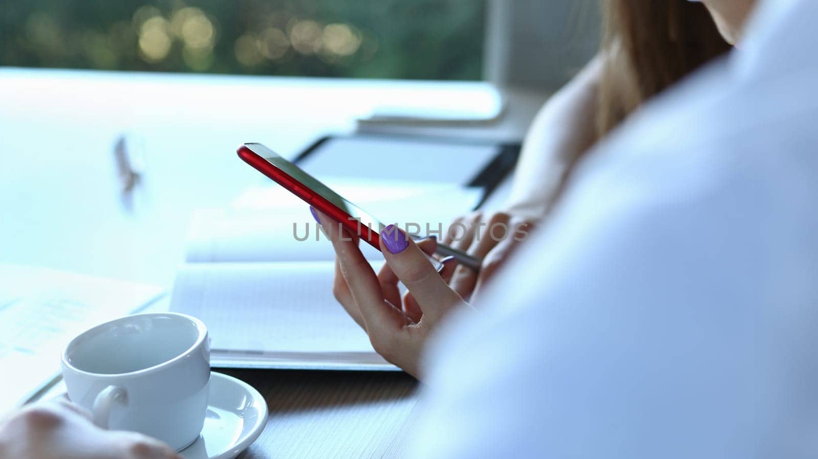 Close-up of woman hold smartphone, typing message, calling someone, modern device for communication. Technology, gadget, digital world, development concept